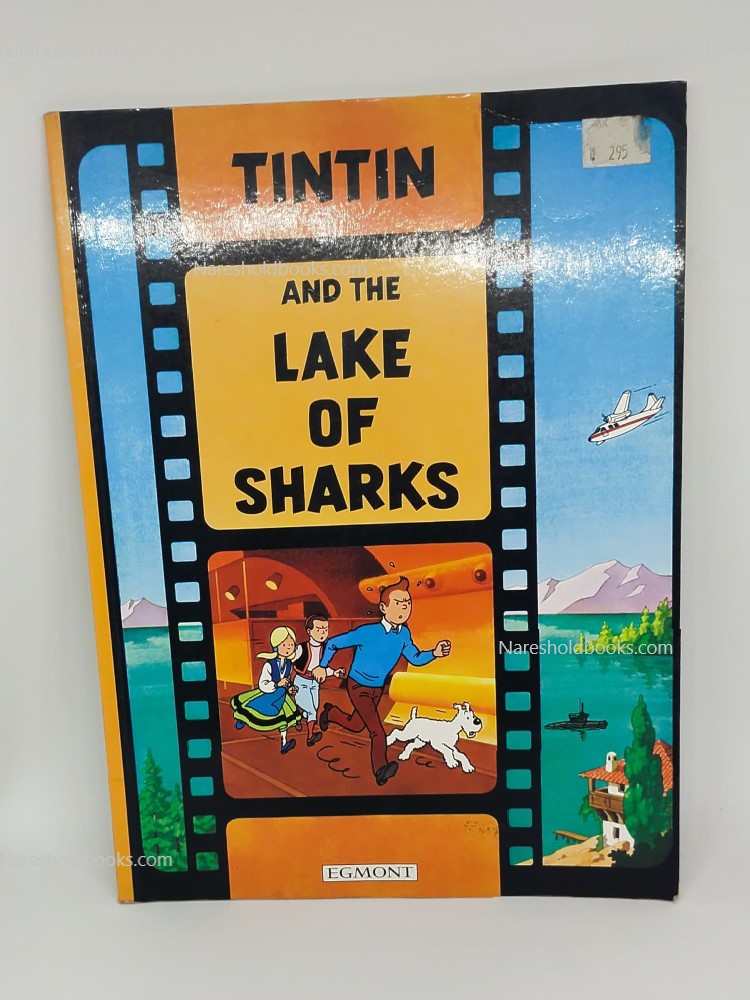 Tintin And The Lake Of Sharks by herge